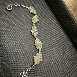 A unique gold plated with silver bracelet